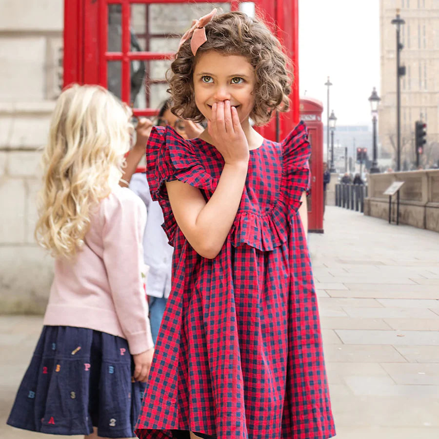 Girls Brayden Ruffle Dress in Navy/Red Gingham
