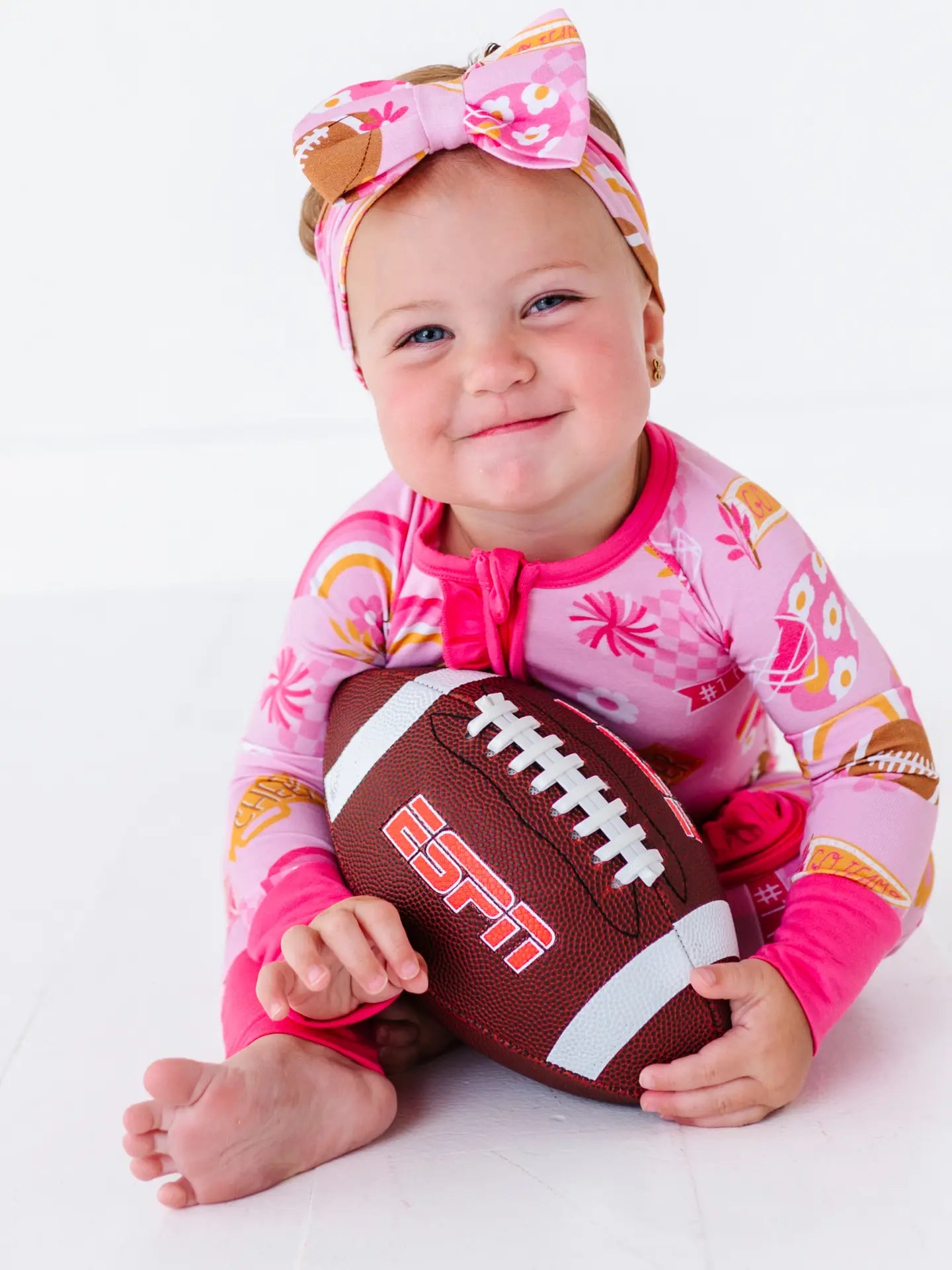 On Game Days We Wear Pink Convertible Footies with Ruffle