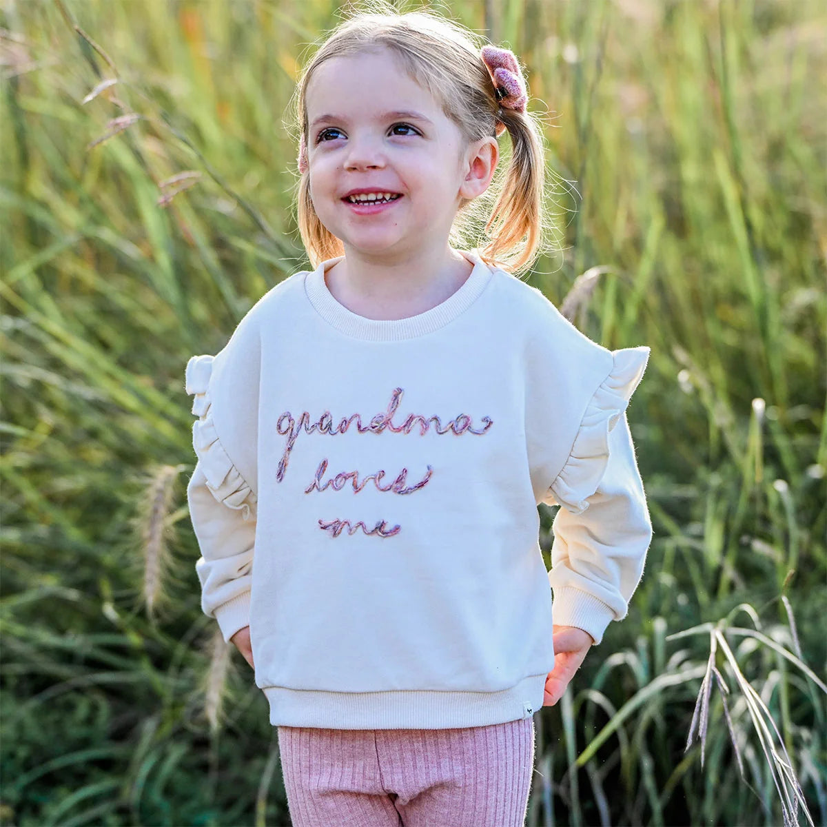 'Grandma Loves Me' Ruffle Slouch Sweatshirt
